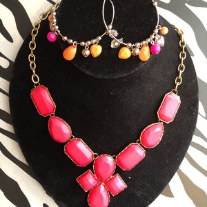 Pink and yellow earrings and pink necklace